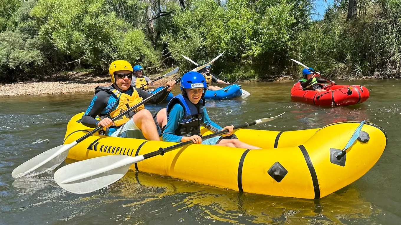 Family packrafting on the river