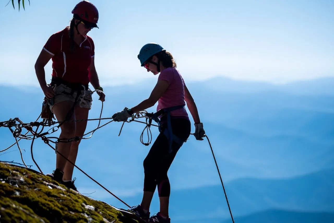 A beginner abseiler on the rim of Mount Buffalo Gorge
