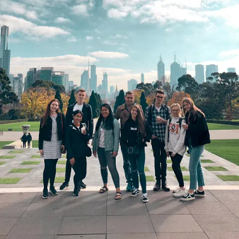 Melbourne skyline with travel families