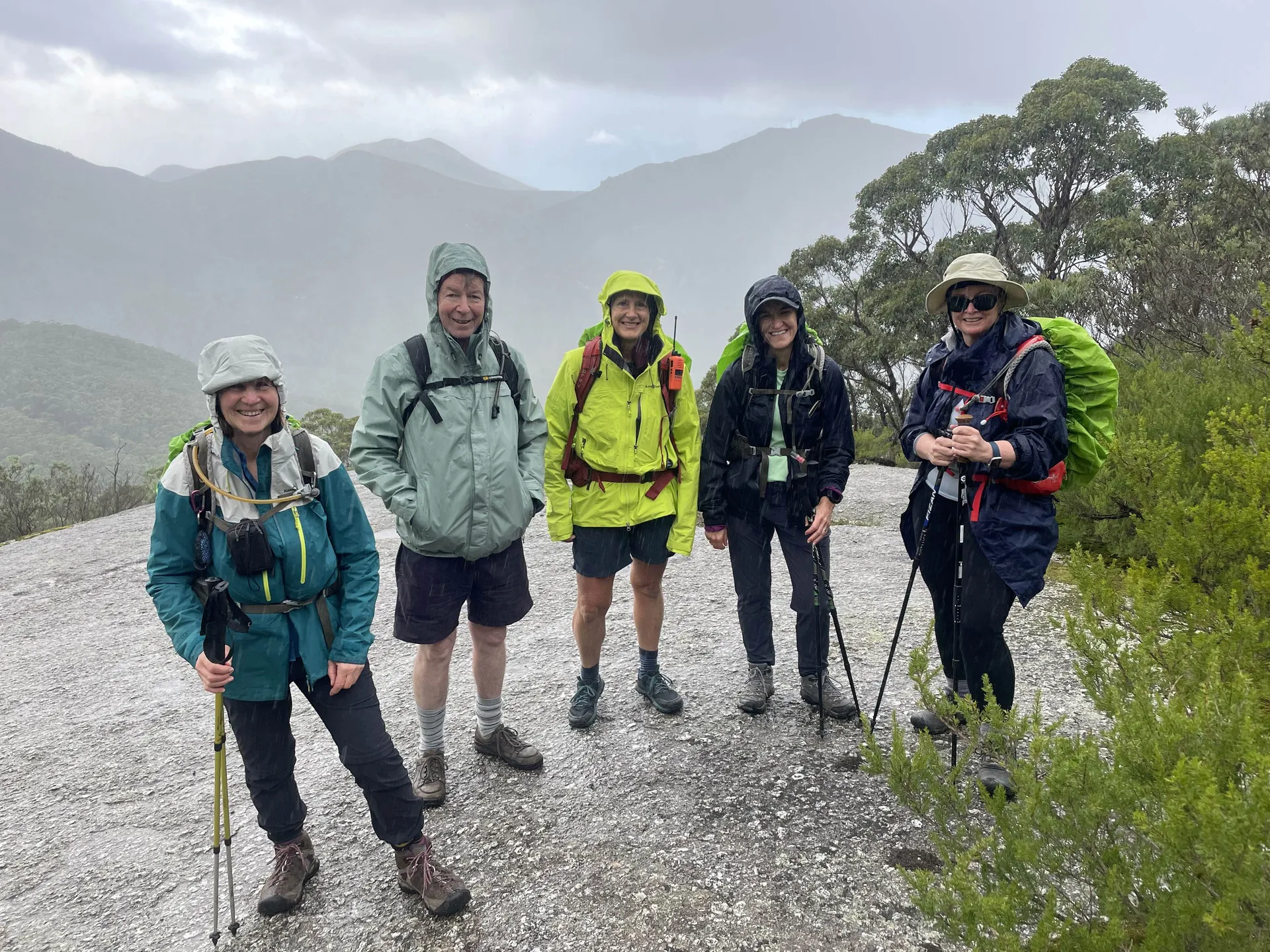 Guests walking in light rain at Wilsons Promontory
